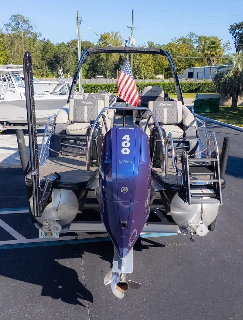 Slide: The Image of The image shows a 2024 Barletta Reserve Leggera 26MA boat with a 400 HP engine. - 5