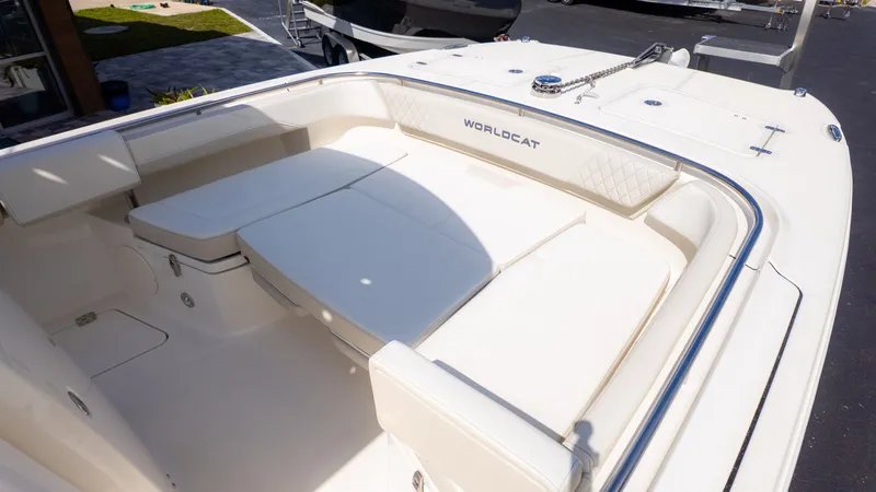 Slide: The Image of The image shows the spacious cockpit of a World Cat 265CC boat with comfortable seating. - 12