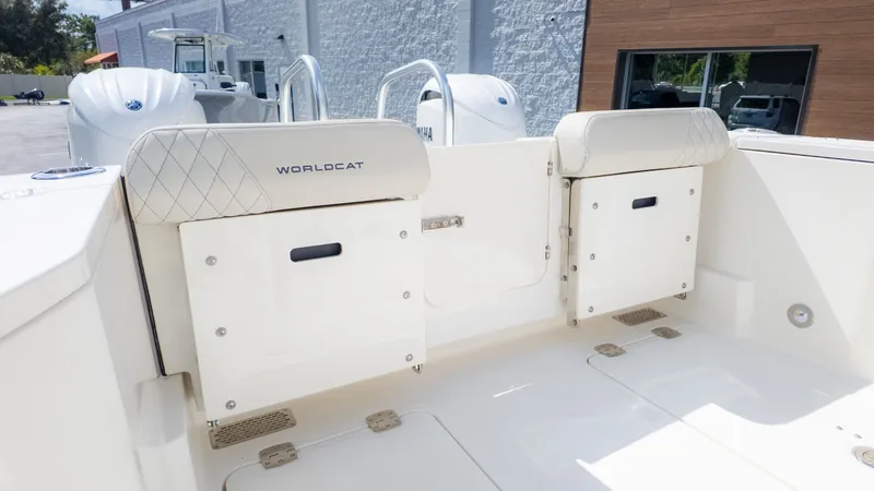 Slide: The Image of The image shows the stern of a World Cat 265CC boat with two seats and storage. - 4