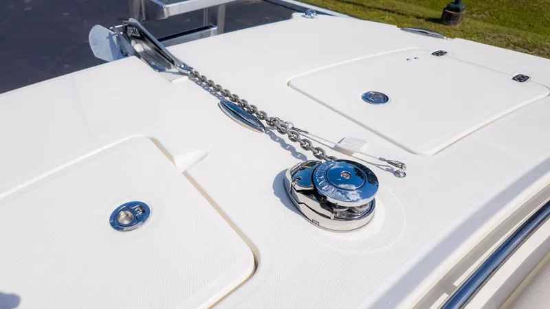 Slide: The Image of Close-up of a World Cat 265CC deck with anchor chain and hatches. - 24