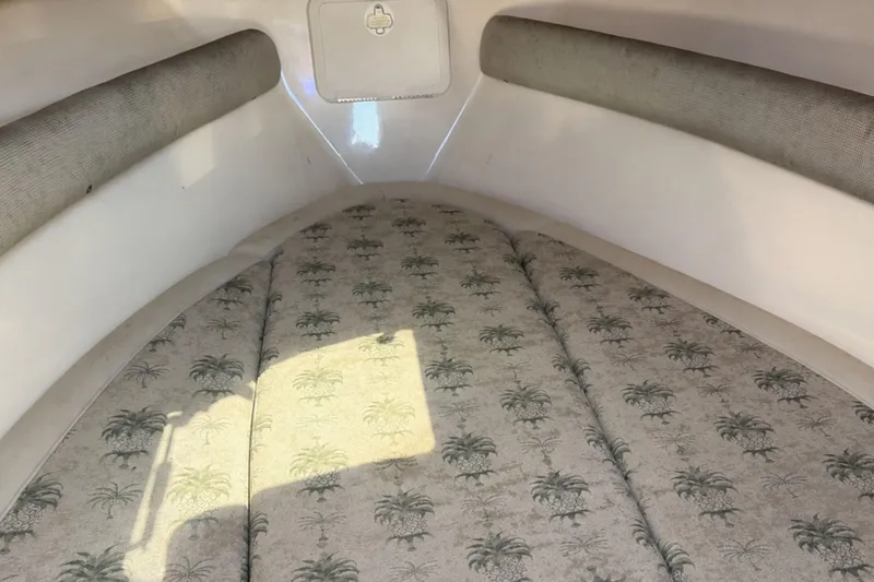 Slide: The Image of Interior cabin of 2008 Scout 222 Abaco boat with patterned cushions. - 20