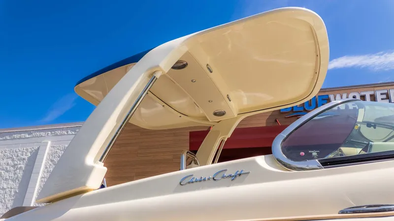 Slide: The Image of Chris-Craft Launch 28 GT 2025 with sleek hardtop and modern design. - 33