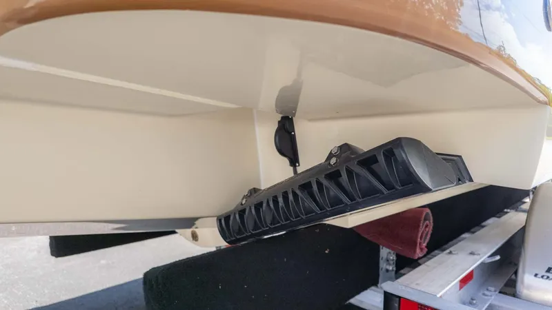 Slide: The Image of Close-up of the hull of a 2025 Chris-Craft Launch 28 GT on a trailer. - 5