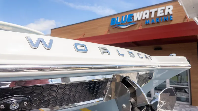 Slide: The Image of Close-up of the World Cat 280 Dual Console in front of a Bluewater Marine building. - 15
