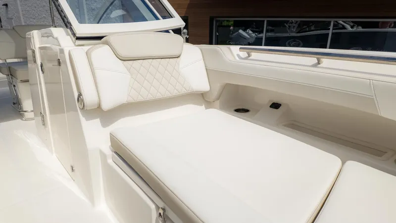 Slide: The Image of Luxurious lounging area on a World Cat 280 Dual Console boat. - 29