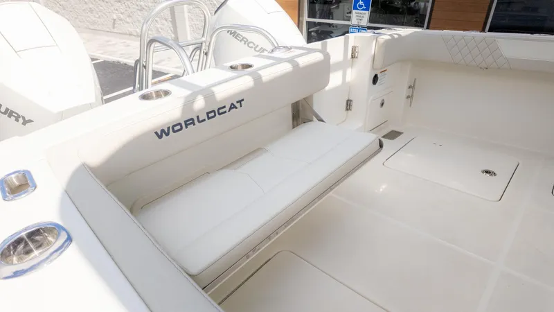 Slide: The Image of The image shows the cockpit of a World Cat 280 Dual Console boat with comfortable seating. - 8
