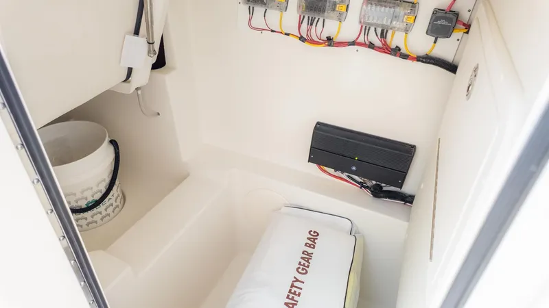 Slide: The Image of Interior of a boat with safety gear and electronics. - 25