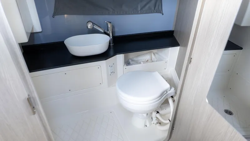 Slide: The Image of Modern bathroom with sink and toilet on a boat. - 37