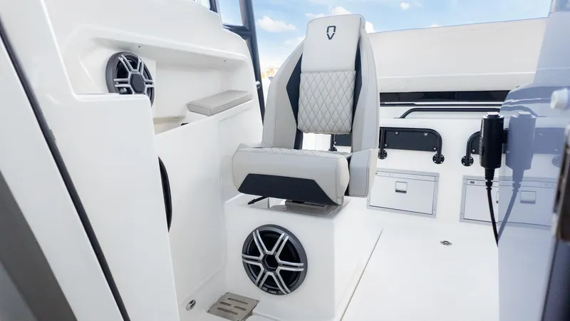 Slide: The Image of The image shows the interior of a Navan S30 boat with modern seating and speakers. - 29