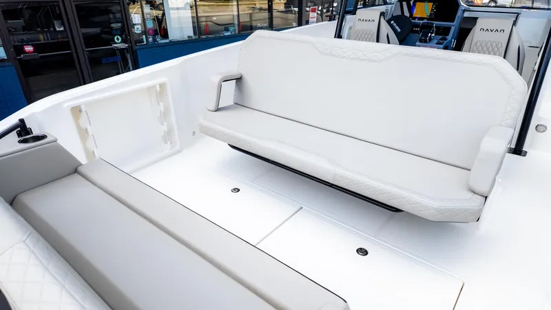 Slide: The Image of The image shows the cockpit of a Navan S30 boat with white upholstery and modern controls. - 18