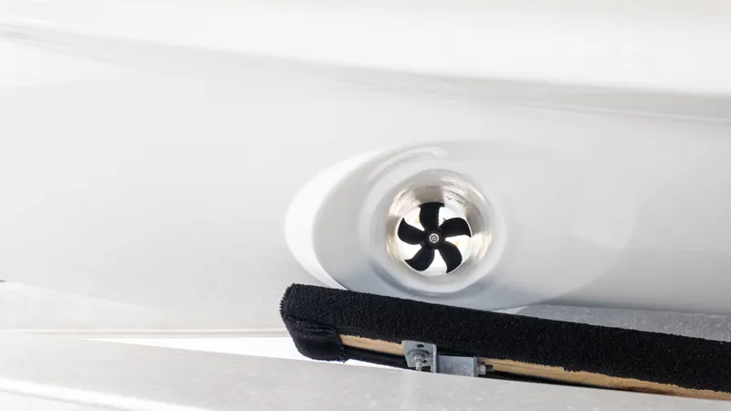 Slide: The Image of Close-up of a boat hull with a small propeller. - 3