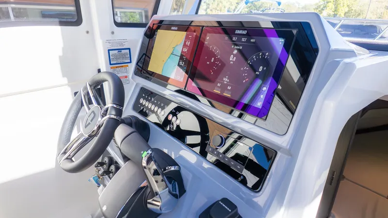 Slide: The Image of The 2026 Navan C30 cockpit features modern navigation systems and a sleek steering wheel. - 26