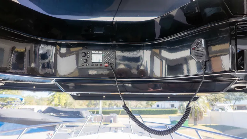 Slide: The Image of The image shows the cockpit of a Navan C30 boat with electronic equipment. - 27