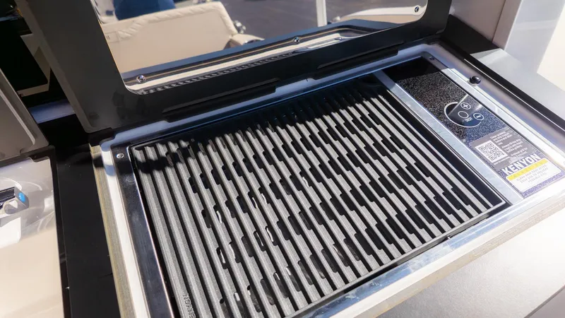Slide: The Image of A grill on a boat with a modern design and a lid. - 8