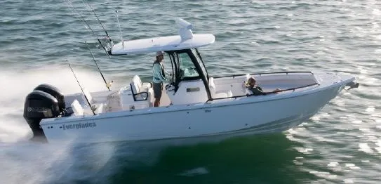 Slide: The Image of 2027 Everglades 273 Center Console on the water. - 27