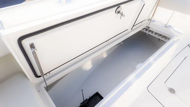 Slide: The Image of A spacious storage compartment on a 2027 Everglades 273 Center Console boat. - 22