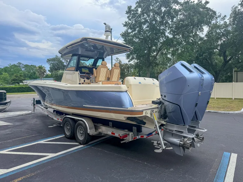 Slide: The Image of Chris-Craft Catalina 30 Heritage Edition 2024 on a trailer with dual outboard engines. - 15