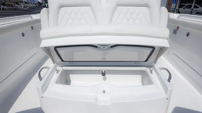 Slide: The Image of The image shows the storage area of a 2026 Everglades 285 Center Console boat. - 11