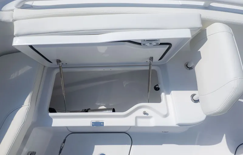 Slide: The Image of Storage compartment in the cockpit of the 2026 Everglades 285 Center Console. - 23