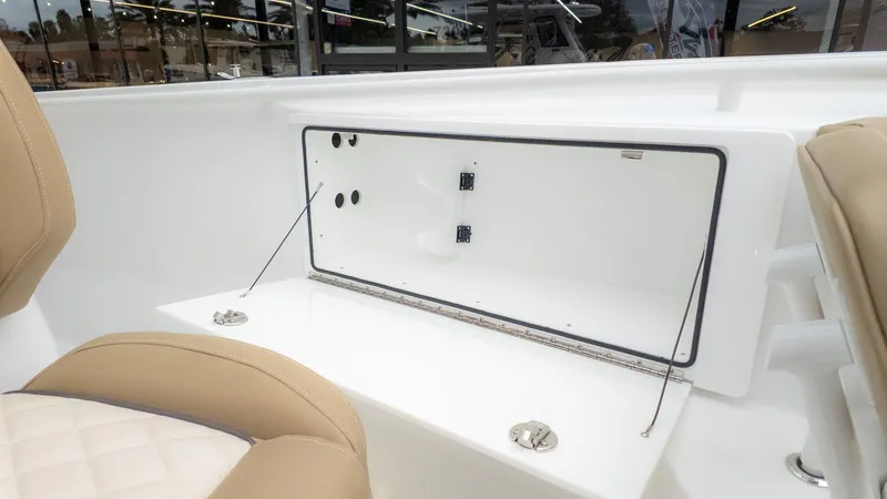 Slide: The Image of Storage compartment in the Everglades 335 Center Console boat. - 15