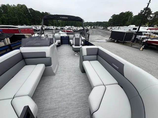 Slide: The Image of The image shows a Viaggio Lago V22U boat with gray upholstery and a Mercury 150HP engine. - 25