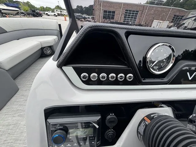 Slide: The Image of The image shows the dashboard of a Viaggio Lago V22U boat with a modern design. - 37