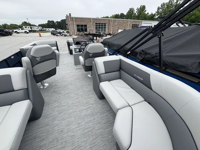 Slide: The Image of Interior of a Viaggio Lago V22U with gray and white seating, parked on a lot. - 22
