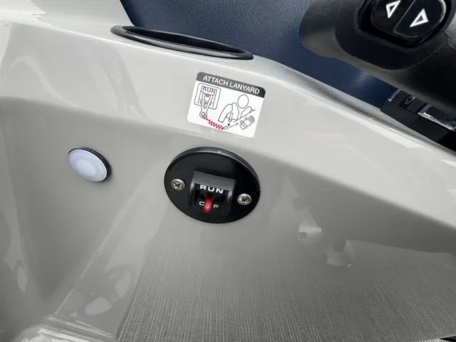 Slide: The Image of Close-up of a switch labeled "RUN" on a boat. - 36