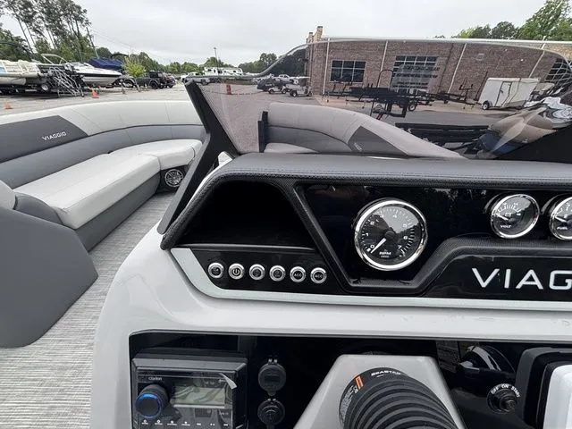 Slide: The Image of The image shows the cockpit of a Viaggio Lago V22U with a Mercury 150HP engine. - 30