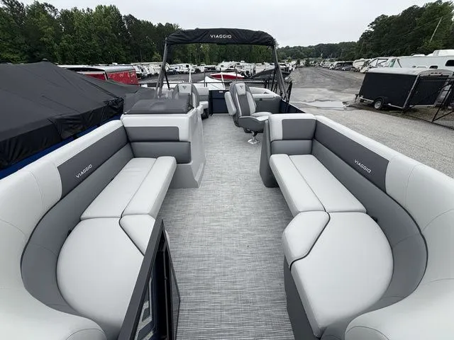 Slide: The Image of Viaggio Lago V22U pontoon boat with gray upholstery and spacious deck. - 7