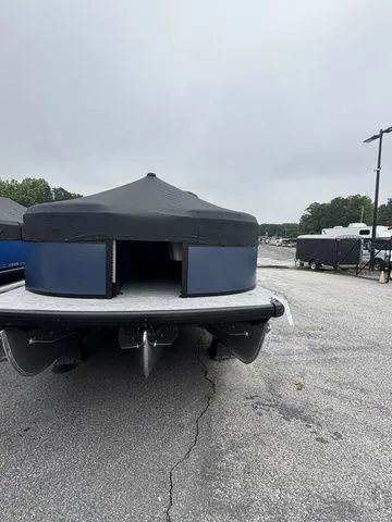 Slide: The Image of A Viaggio Lago V22U pontoon boat with a Mercury 150HP 4-stroke engine is parked on a lot. - 4