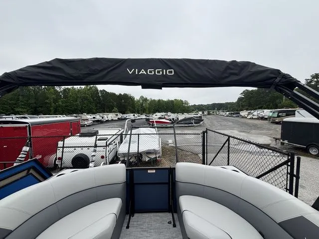 Slide: The Image of Viaggio Lago V22U with Mercury 150HP 4-stroke engine, 2025 model, parked in a lot. - 41