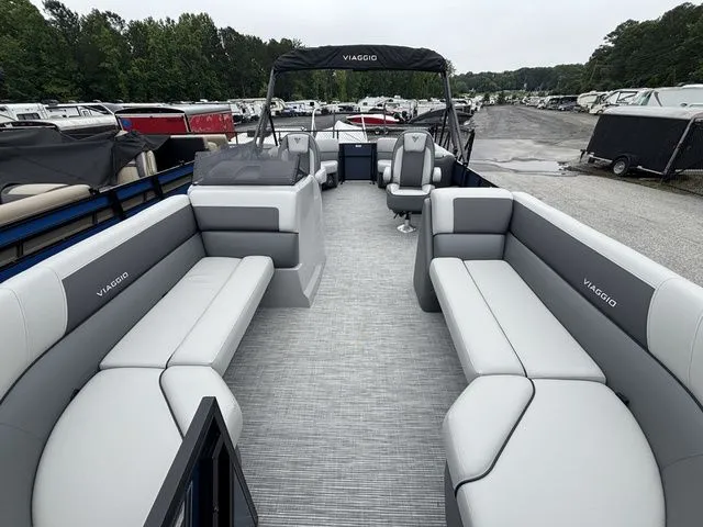Slide: The Image of Viaggio Lago V22U pontoon boat with gray upholstery and spacious deck. - 23