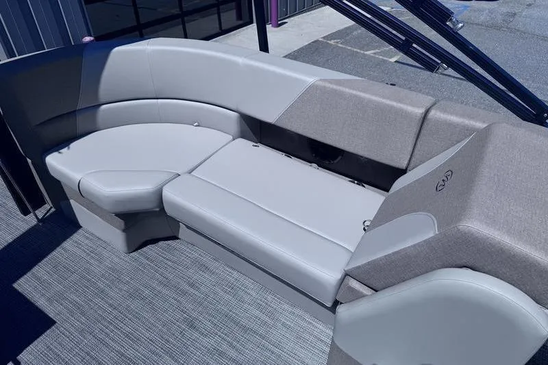 Slide: The Image of Luxurious seating on 2027 Manitou Aurora 23 RF SHP pontoon boat, featuring sleek design and comfort. - 33