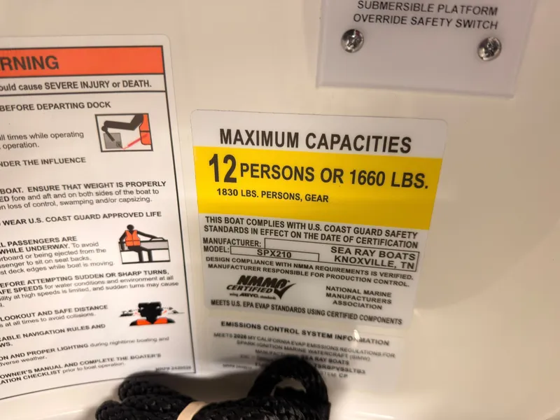 Slide: The Image of Sign shows maximum capacity of 12 persons or 1660 pounds for Sea Ray SPX 210. - 34