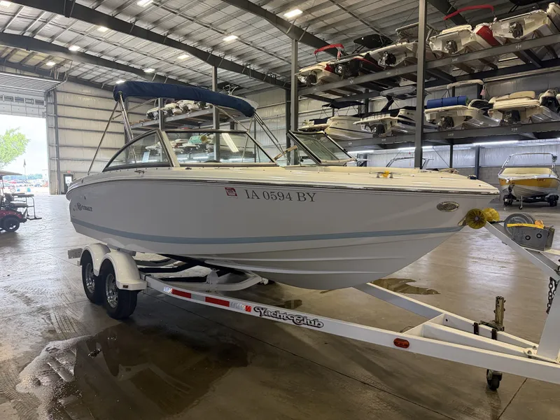 Slide: The Image of A 2015 Cobalt 200 boat on a trailer inside a storage facility. - 6