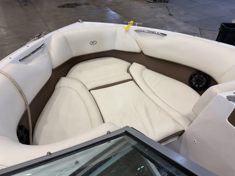 Slide: The Image of The 2015 Cobalt 200 features an elegant, cushioned seating area in white and brown. - 41