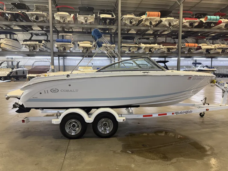 Slide: The Image of A 2015 Cobalt 200 boat on a trailer in a storage facility. - 5