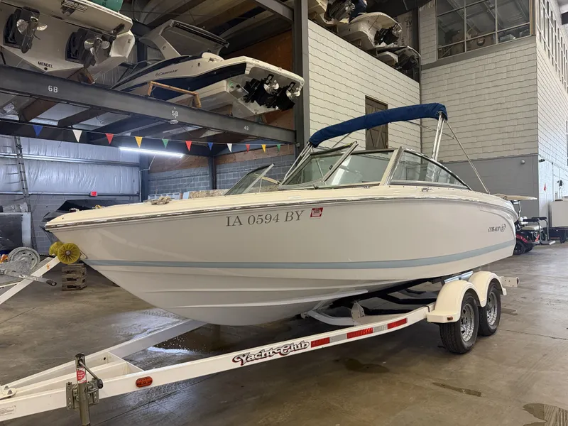 Slide: The Image of A 2015 Cobalt 200 boat is on a trailer in a storage facility. - 47