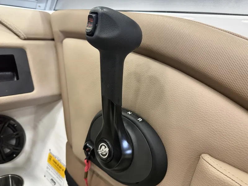 Slide: The Image of Close-up of a boat throttle lever in a 2015 Cobalt 200. - 35