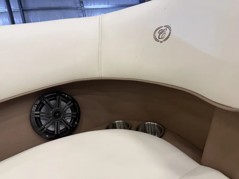 Slide: The Image of Close-up of a Cobalt 200 boat seat with speaker and cup holders. - 42