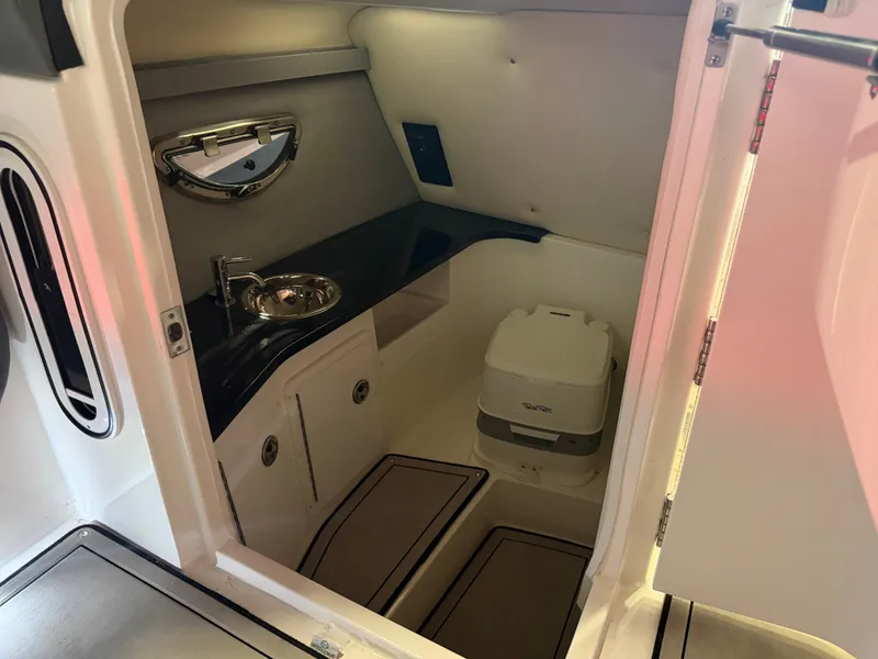 Slide: The Image of The image shows the bathroom of a 2022 Cobalt R30 with a sink and toilet. - 22