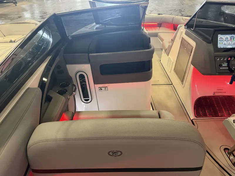 Slide: The Image of The image shows the cockpit of a 2022 Cobalt R30 boat with modern controls and seating. - 21