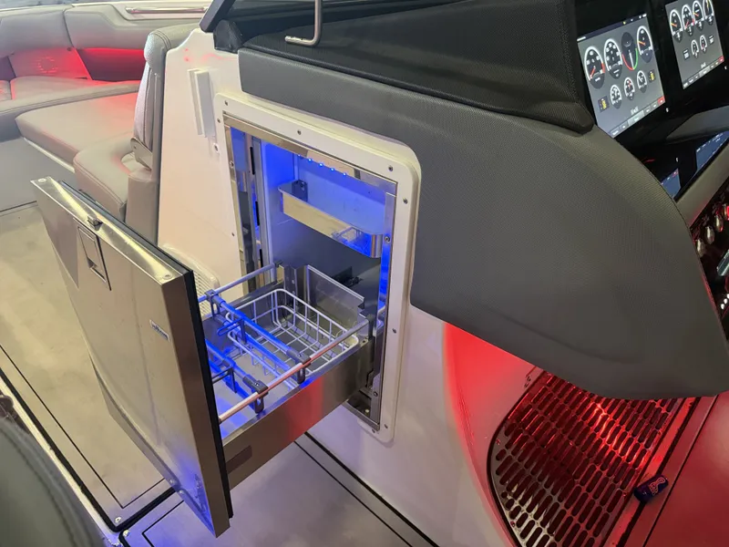 Slide: The Image of An open refrigerator with blue lighting is inside a modern boat. - 43