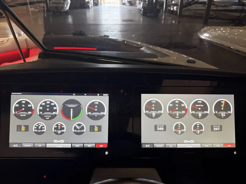 Slide: The Image of The image shows two digital displays on a boat, featuring various gauges and instruments. - 38
