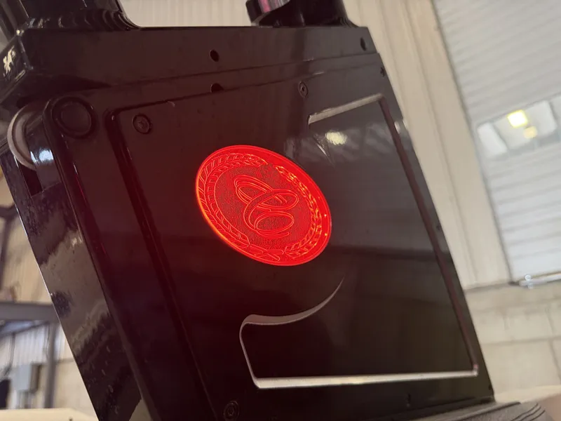 Slide: The Image of A red, glowing Cobalt logo on a black background in a workshop setting. - 29