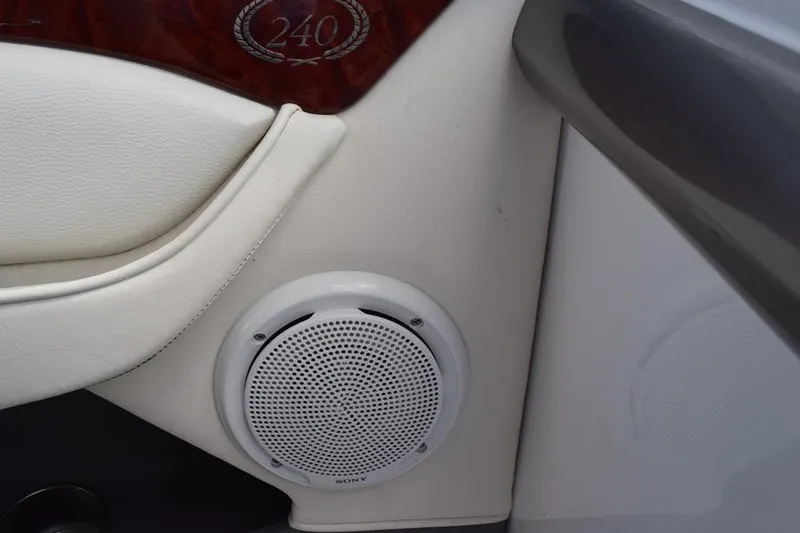 Slide: The Image of Interior of 2006 Cobalt 240 boat featuring Sony speaker and elegant design. - 22