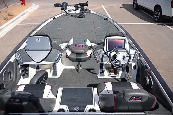 Slide: The Image of 2017 Ranger Z521 Comanche Cup-Equipped boat interior with dual consoles and seating. - 12
