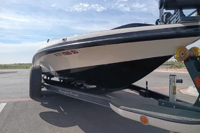 Slide: The Image of 2017 Ranger Z521 Comanche Cup-Equipped boat on trailer, parked outdoors. - 9