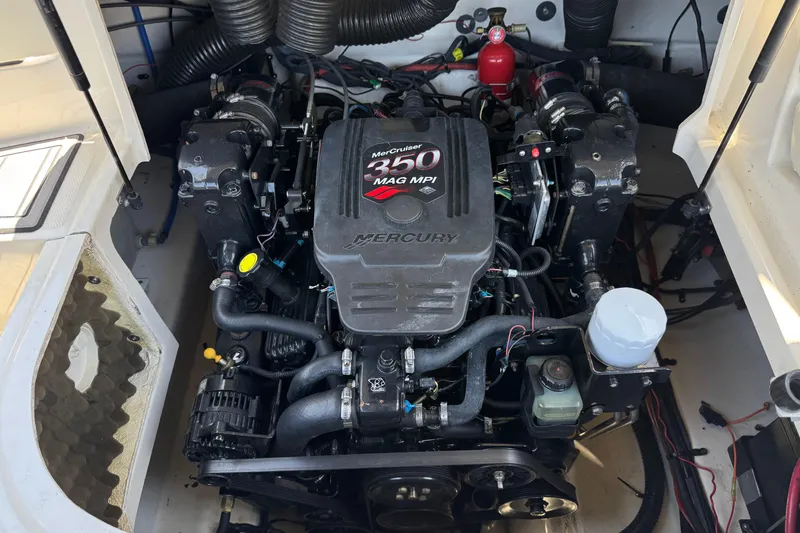 Slide: The Image of Engine compartment of a 2007 Sea Ray 240 Sundeck with MerCruiser 350 MAG MPI engine. - 28